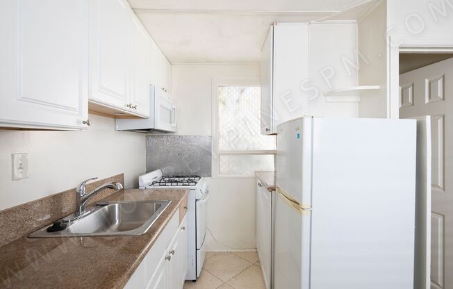 7409-13, 15 Eads Avenue