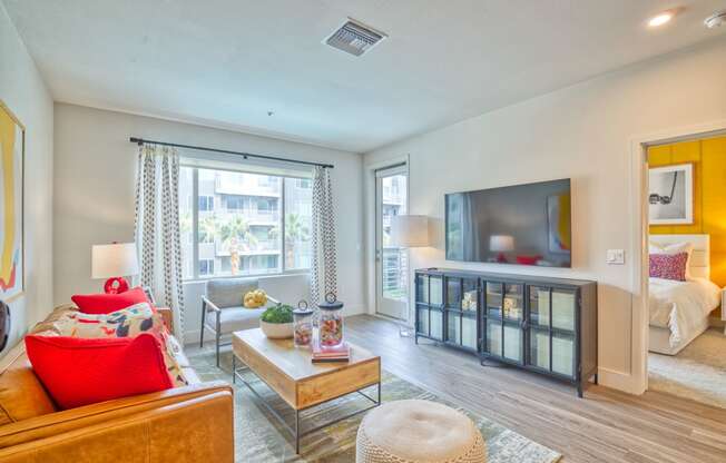 a living room with a couch and a tv