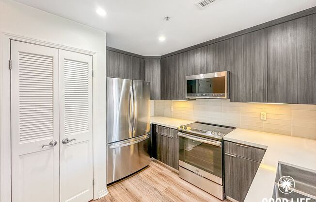 Luminous 3BD/2BA Corner Unit in Little Italy with City Views, W/D & Private Balcony