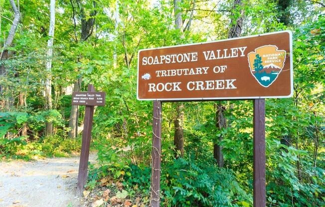 a sign for the sagottic valley tribulation of rock creek in the woods