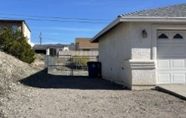 North side home, pet friendly with fenced back yard.