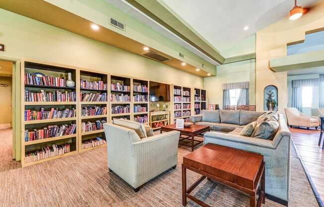 Community library sitting area at Country Club at The Meadows Senior Apartments in Las Vegas, NV, For Rent. Now leasing 1 and 2 bedroom apartments.