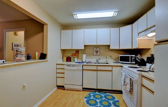 Image of kitchen with  cabinets and appliances