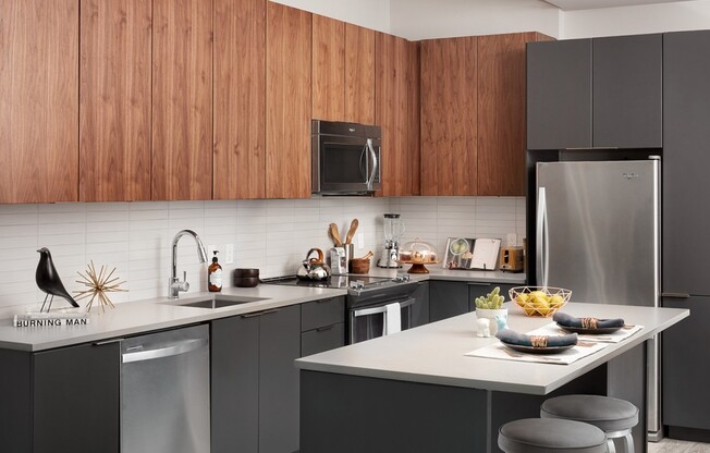 Chef-inspired kitchens enhance your entertaining skills with Caesarstone® quartz countertops, tile backsplashes, and kitchen islands for prep work