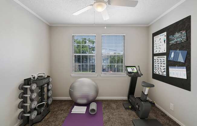 flexible living spaces  Living Room with wood flooring at Midtown Oaks Townhomes in Mobile, AL