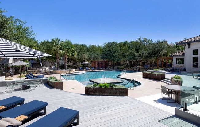 a pool and patio area at the resort at napoleon