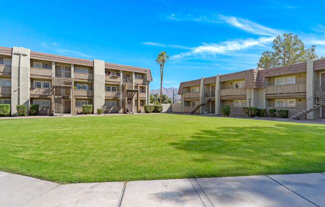 Property Exterior with Lawn at Verde Apartments in Tucson, AZ, 85719