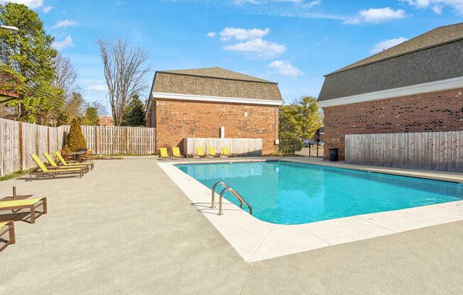 Escape to the serene poolside at Icon Downtown Durham. Enjoy a refreshing dip or relax on the sun-soaked deck. This inviting outdoor space is perfect for unwinding and socializing. Schedule your visit today to see it for yourself!