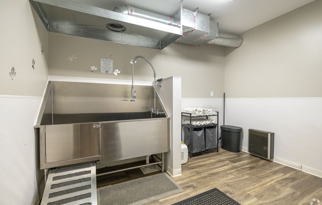 a kitchen with stainless steel appliances and a sink