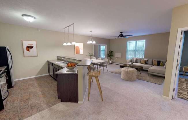 A kitchen with a refrigerator, oven, and a dining table with chairs.at The Ponds at Heritage Place, Sartell