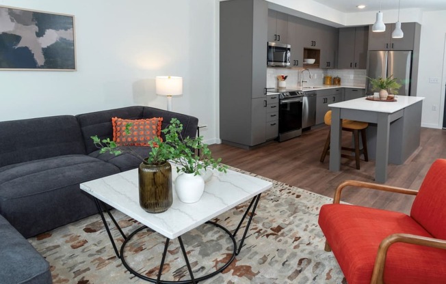 a living room with a couch and a table