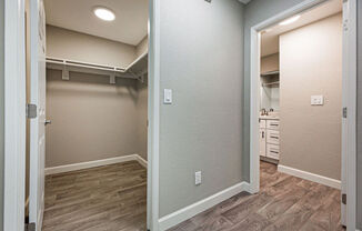 a renovated basement with a closet and a door open to a bathroom at Citra Apartments LLC, San Diego, CA, 92107