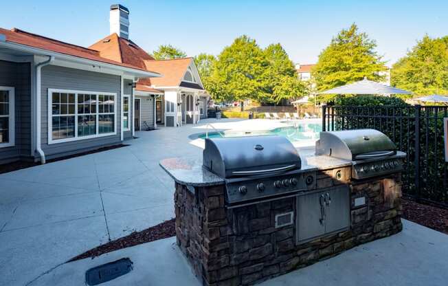 Gas Grills at Pool at One Rocky Ridge Apartment, Georgia