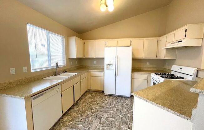 A SPACIOUS SINGLE STORY WITH TILE FLOORING, 3 BEDROOM & 2 BATH HOME LOCATED NEAR THE NELLIS AIR FORCE BASE WITH NEARBY SHOPPING CENTERS AND FAMILY PARK. MINUTES AWAY FROM THE I-15 FREEWAY!