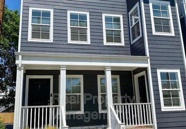 311 W 13 ST 309 W