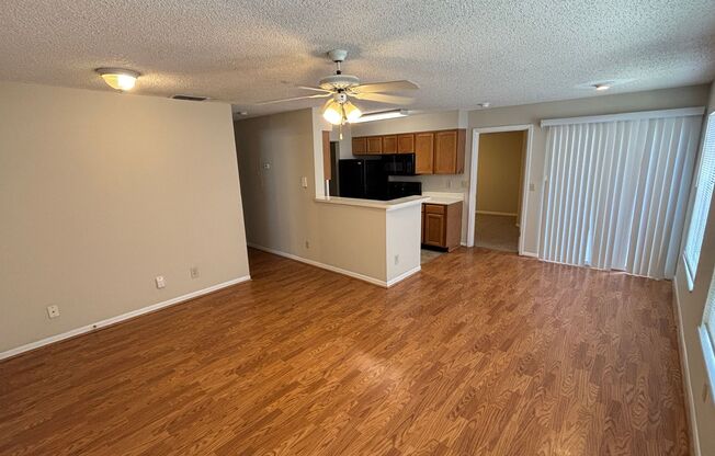 2BR/2BA Tradewinds Condo with Wood Floors - Priced to Rent!