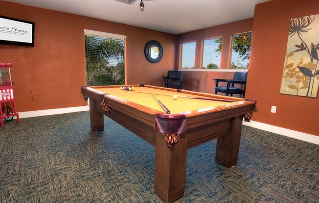 Residents can enjoy a game of billiards in the clubhouse.