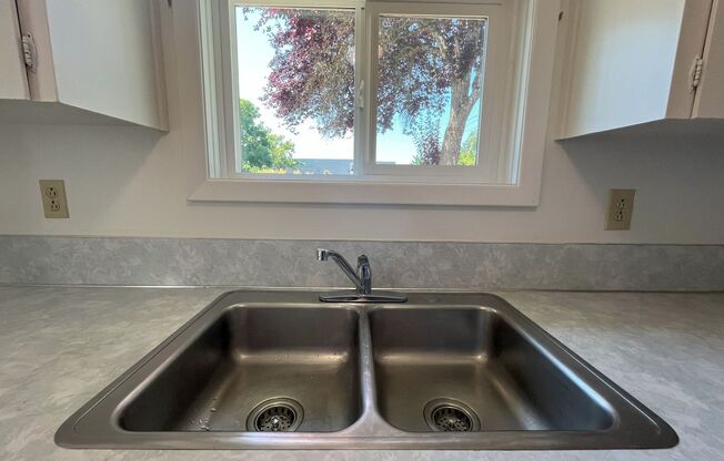 Charming 2-Bedroom Home with Open Living Space and Tile Flooring