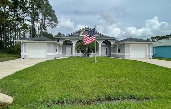 Charming 3 Bedroom 2 Bath in LeHigh Woods with Multi-purpose Room, Fully Fenced Back Yard and Solar Panels!!