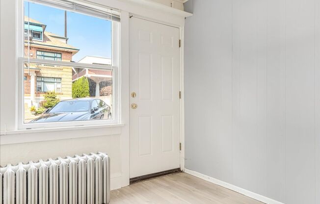 Spacious, Charming Victorian Style Tri-Plex Located in Goose Hollow!