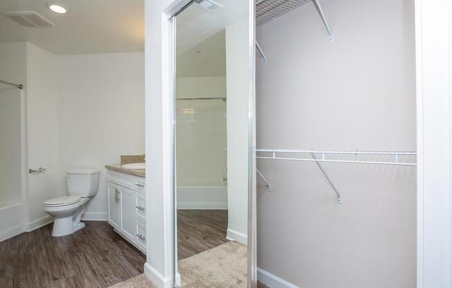 a large white tub sitting next to a shower