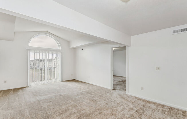 Large Living/Dining Areas with Cathedral or 9' Ceiling  at Stoney Pointe Apartment Homes in Wichita, KS