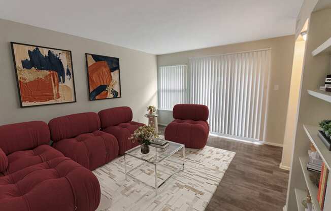 This is a photo of a virtually staged living room in the 650 square foot 1 bedroom, 1 bath apartment at Preston Park Apartments in Dallas, TX.