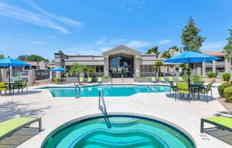 A swimming pool with a slide in the middle of it.