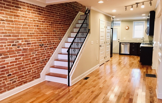 Charming 2 Bedroom/3 Bathroom Townhome w/ Den and In-Unit Laundry in Locust Point, MD! - Parking Pad!