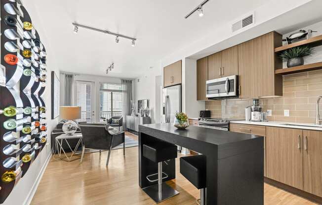 a kitchen and living room in a 555 waverly unit