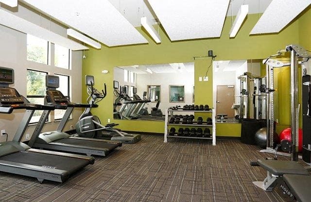 Treadmills And Free Weights In Gym at The George & The Leonard, Atlanta