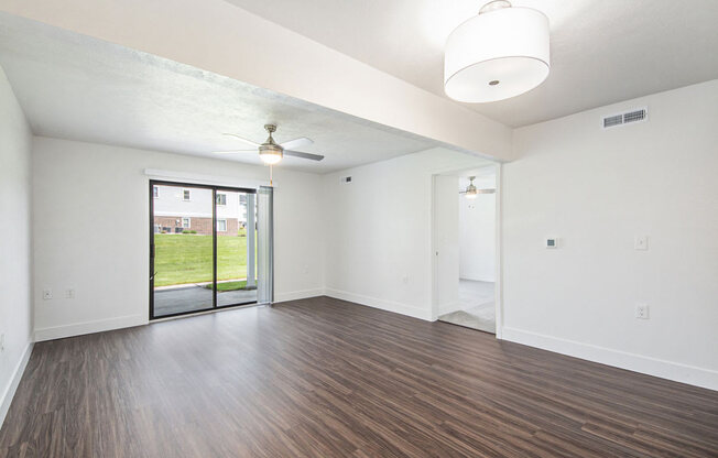 Two Bedroom Living Room with Ceiling Fan at The Crossings Apartments, Grand Rapids, Michigan