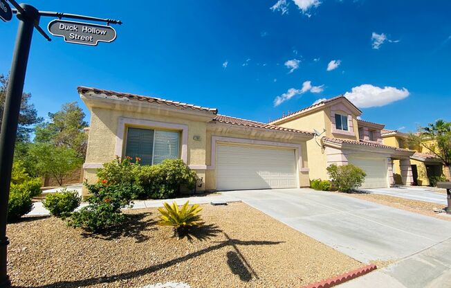 SINGLE STORY HOME INSIDE GUARD GATED RHODES RANCH COMMUNITY WITH FOUR BEDROOMS LOCATED IN A CUL-DE- SAC!