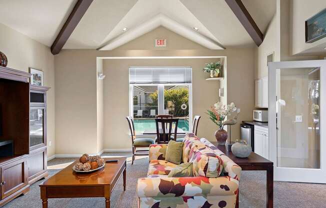 a living room with a couch and a table