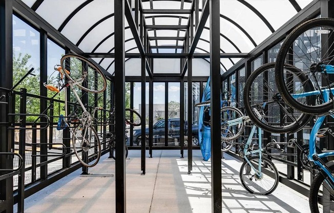 a row of bikes parked in a building