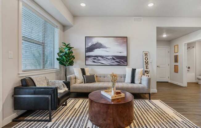 a living room with a couch and a coffee table