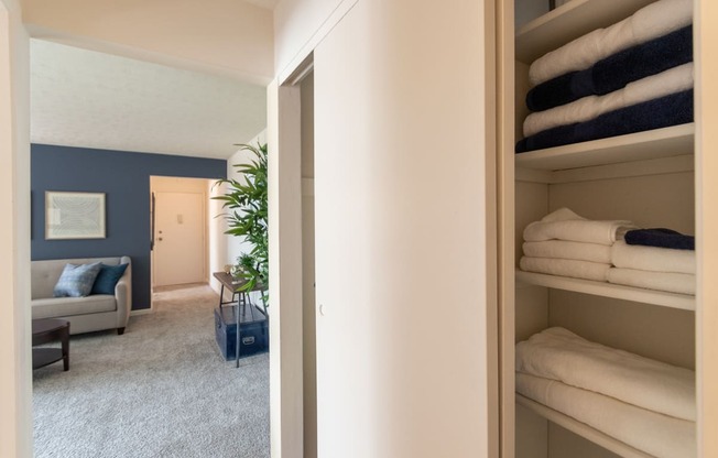 This is a picture of the hall storage/linen closet in the 850 square foot, 1 bedroom, 1 bath apartment at Fairfield Pointe Apartments in Fairfield, Ohio.