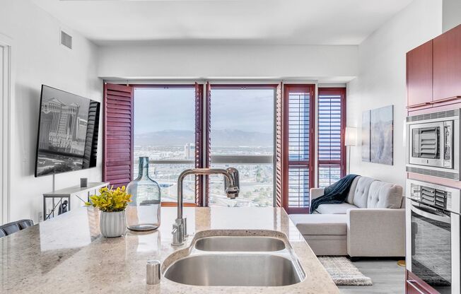 High-Rise Living: 2-Bedroom Retreat with Strip Views