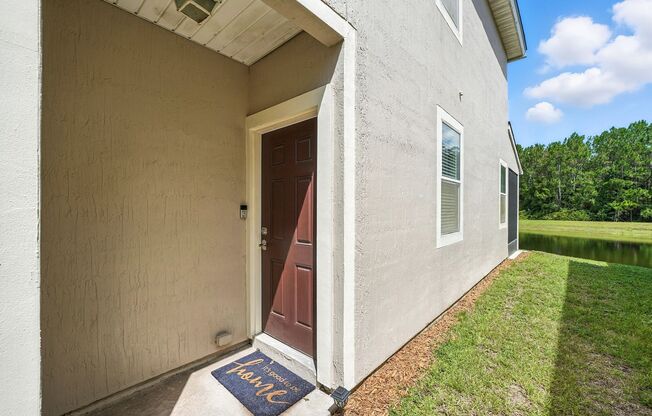 Immaculate three-bedroom, three-bath end-unit townhome showcasing upgrades throughout.