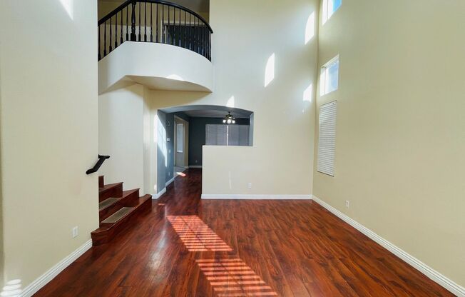 Large 5 bedroom family home right off of Blue Diamond, in gated community, with a full bedroom and bathroom downstairs!