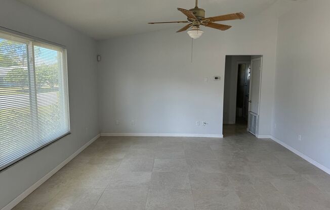 REMODELED WITH NEW KITCHEN, BATHROOMS, TILE FLOORING THROUGHOUT AND FRESHLY PAINTED INSIDE!