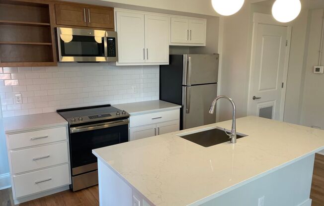 210-218 W 12th