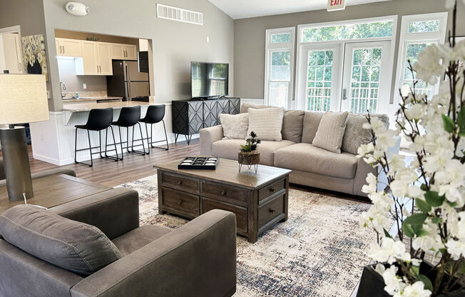 Modern community building with lounge spaces at Tall Oaks Apartment Homes in Kalamazoo, MI 49009