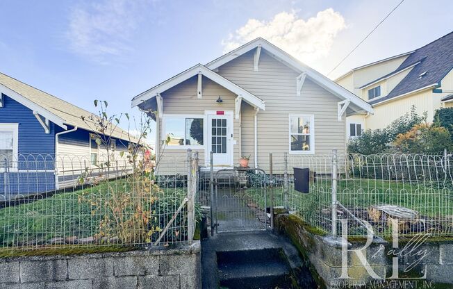 Light-Filled Home with Vaulted Ceilings, Bonus Basement & Walkable Location