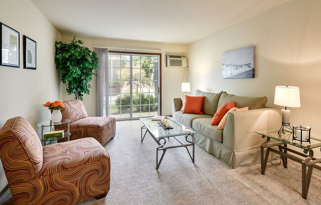 living room with natural light at river's edge apartments