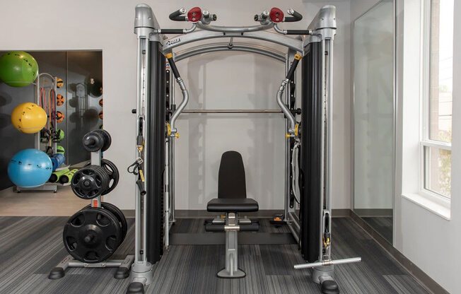 fitness room with weights and yoga room at Urban Park I and II Apartments, Minnesota