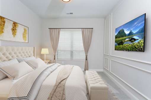 a bedroom with a large bed and a large window at Fairfax, Grandview, OH
