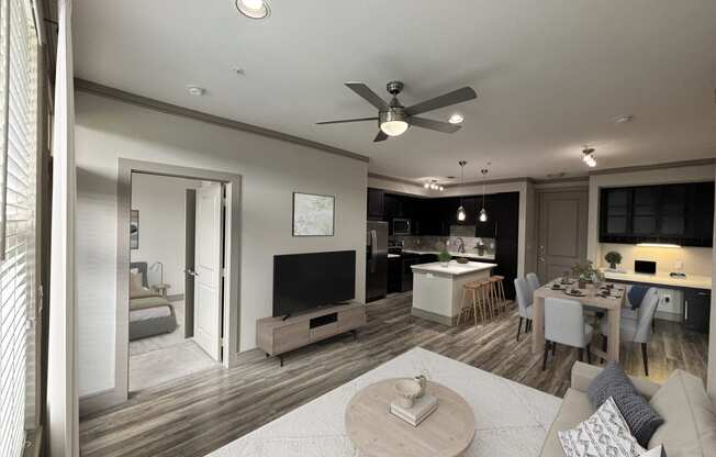 a rendering of a living room and kitchen in a house