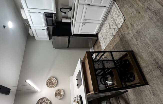 an overhead view of a kitchen and a living room from above