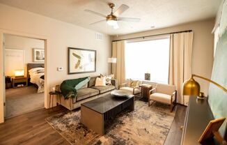 Living Room With Expansive Window at Soleil Lofts Apartments, Herriman, 84096